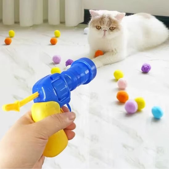 Jouet pour chat interactif - Pistolet à pompons - Chatyfyclub